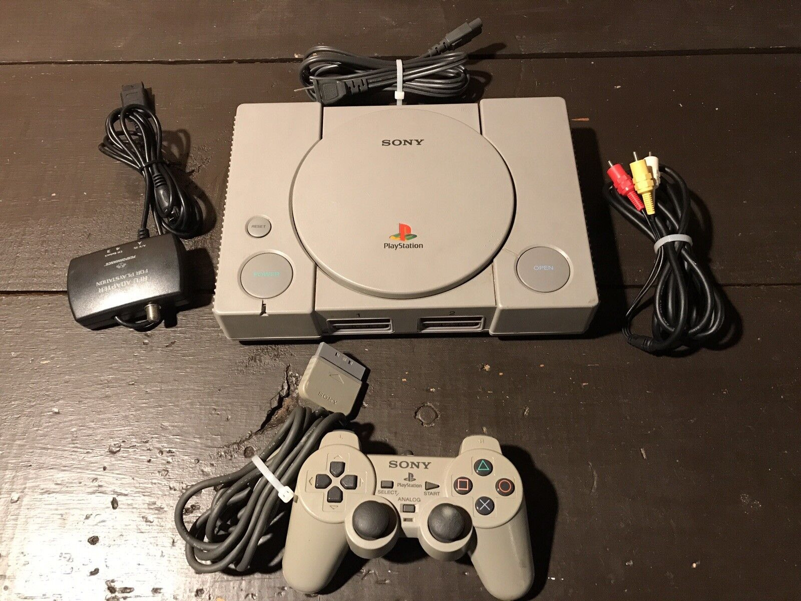 https://truemedian.com/sony-playstation-ps1-gray-console-system-scph-1001-w-analog-controller-tested/